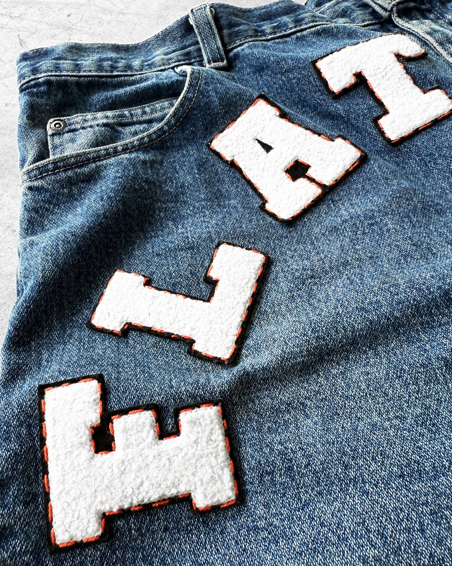 VARSITY JEAN SHORT